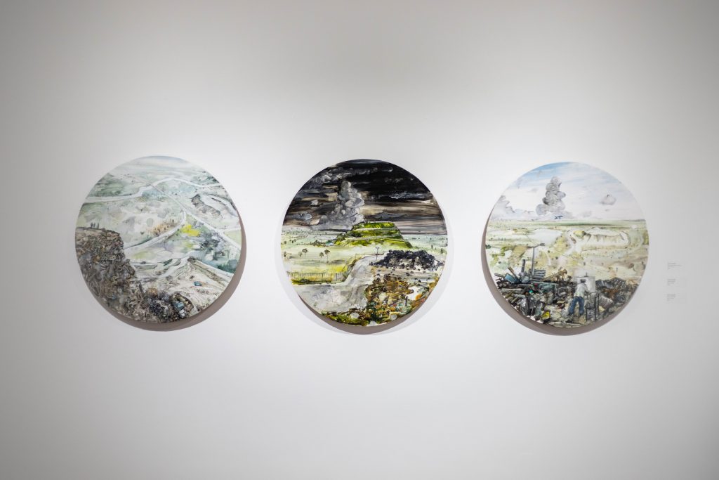Amer Kobaslija's artwork in the 2018 Faculty Show. A tryptic of 3 circular paintings.