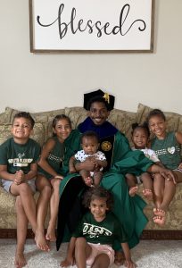 Dwight Lewis with his nieces and nephews