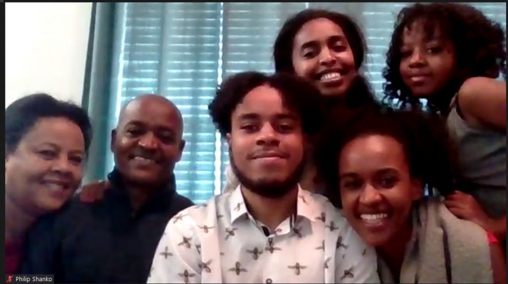 Philip Shanko, fall 2020 BA grad, with family at virtual celebration