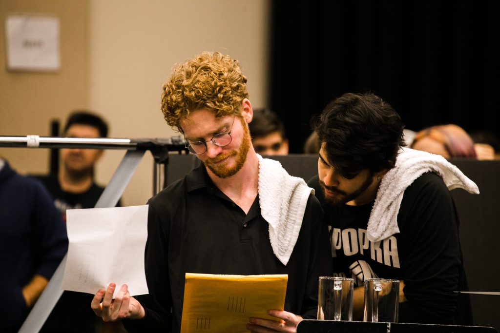 Theatre UCF Students Zachary Racine and Jonathan Gardon going over their lines during The Resistible Rise of Arturo Ui rehearsal.